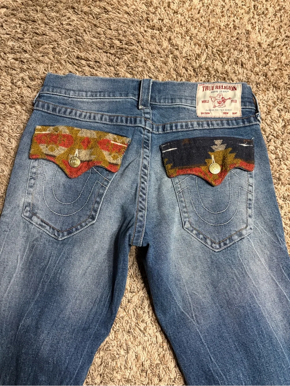 True Religion Men’s Blue Jeans with Multicolor Aztec Pocket Flaps
